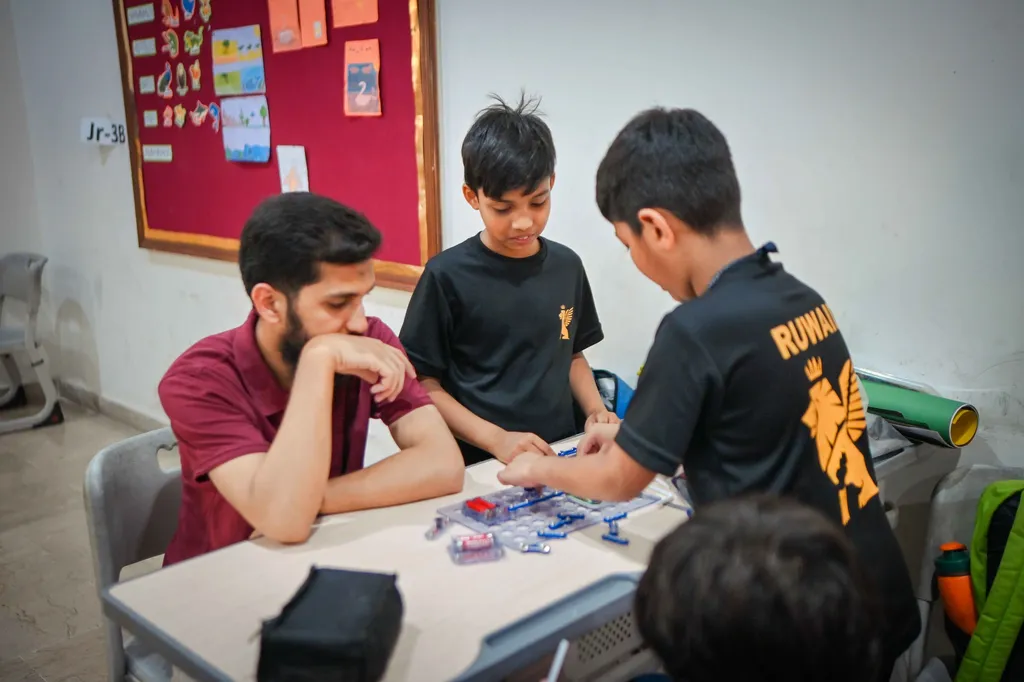 Students building circuits